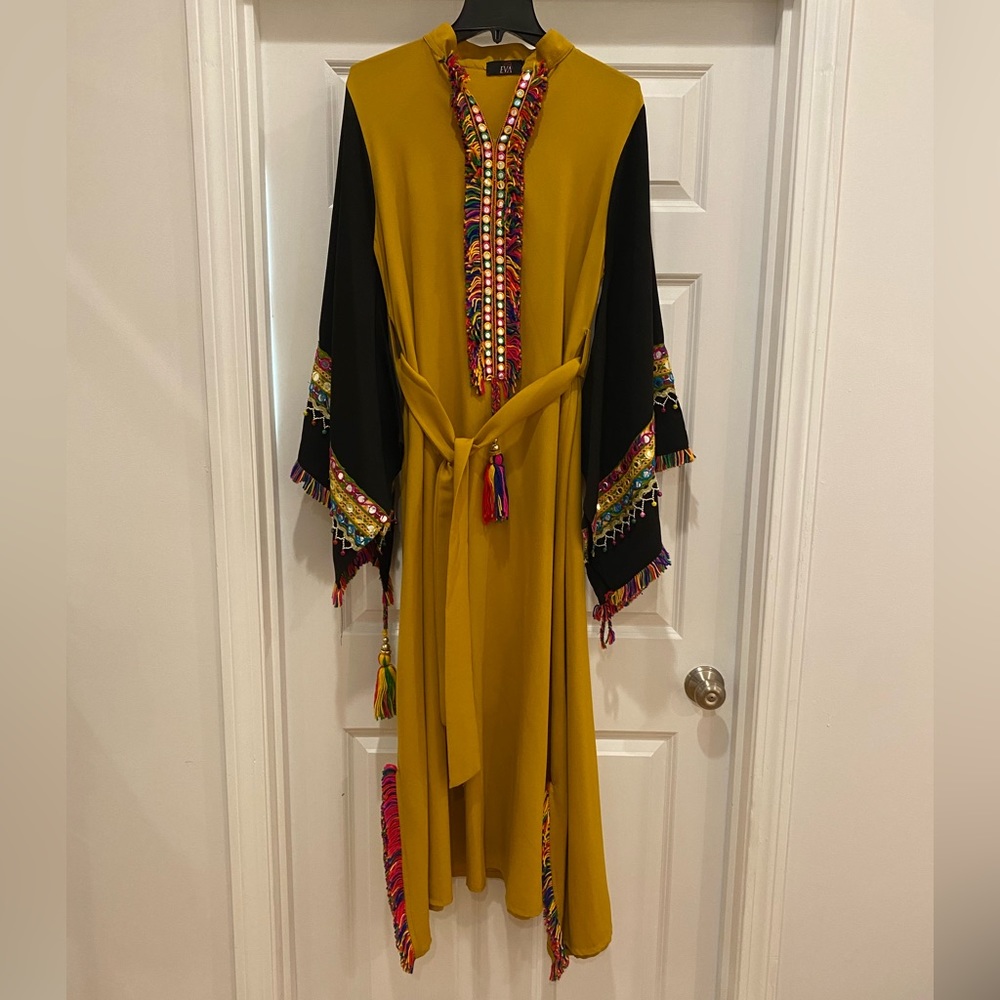 Multi color kaftan with beading on the front and the sleeves.